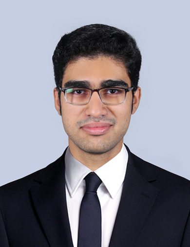 A passport size image of a strategy consultant in professional attire.